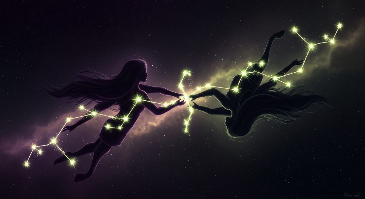 Two astrological charts overlaid in gold and violet light